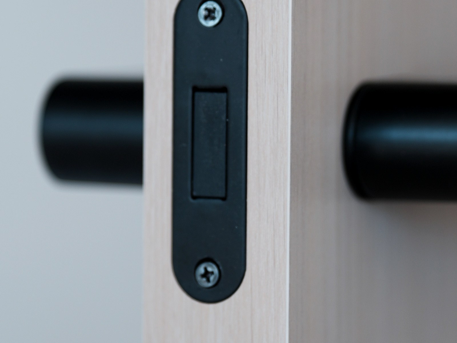 Close-up of the ORI magnetic lock tongue and handle detail