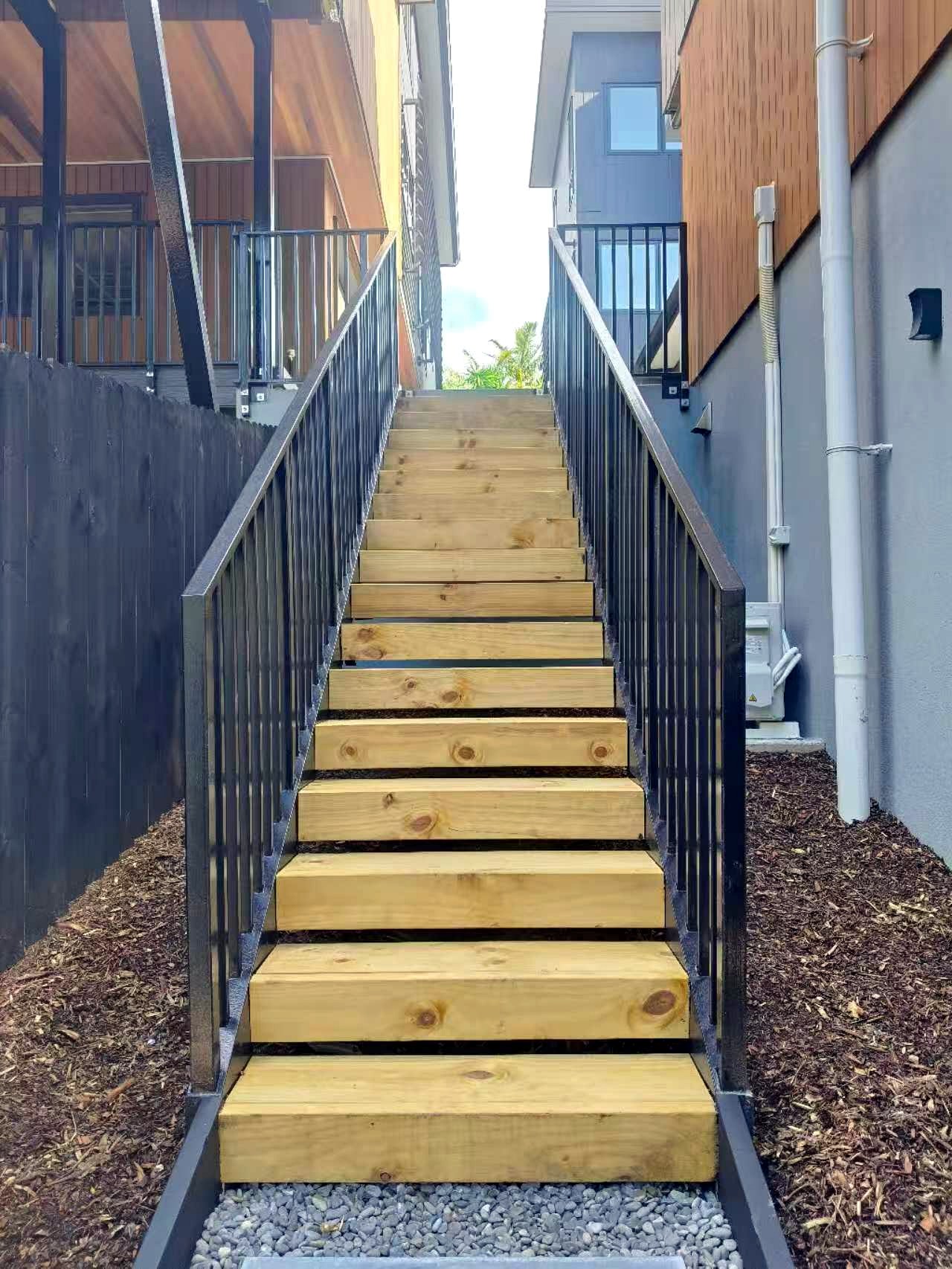 Completed ORI Outdoor Stair System between townhouse buildings