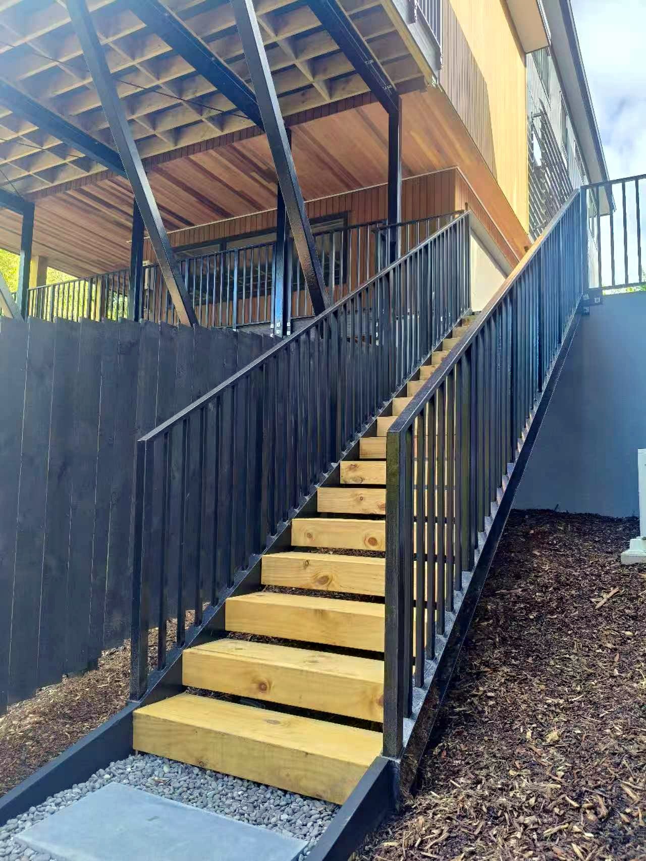 ORI Outdoor Stair System installed on a sloped townhouse site